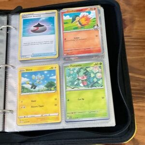 Pokemon Card Collection with Red, Yellow, and Green Cards